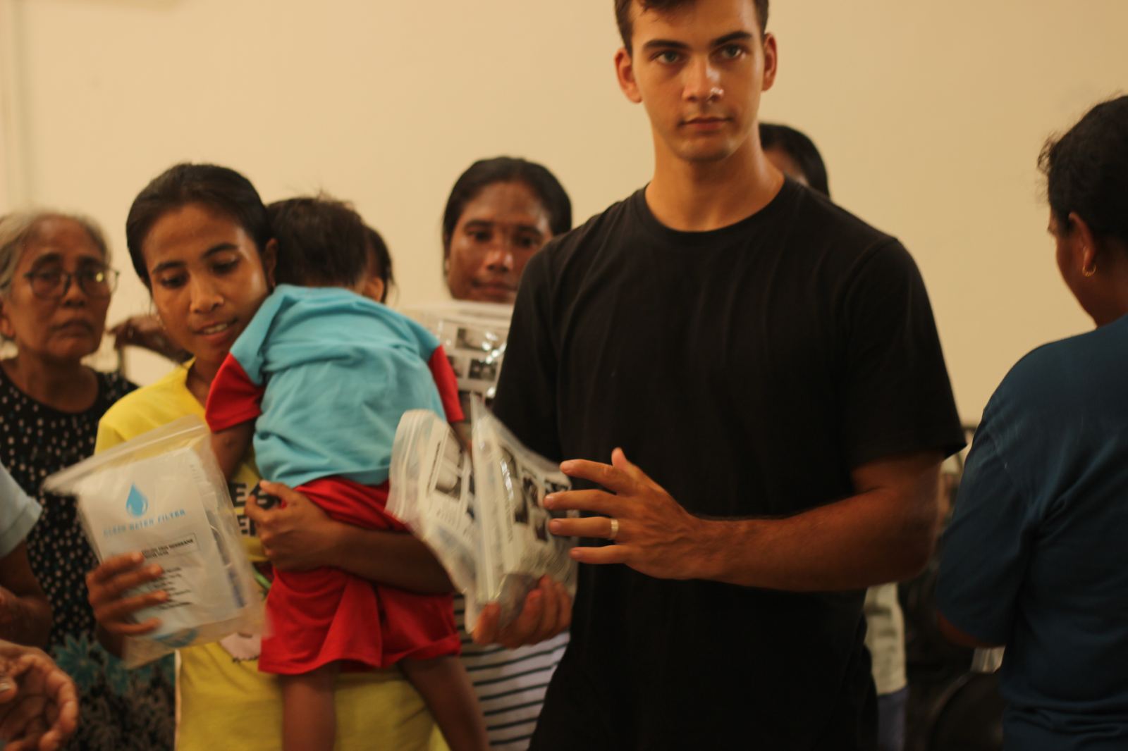 Mother and child with water filter